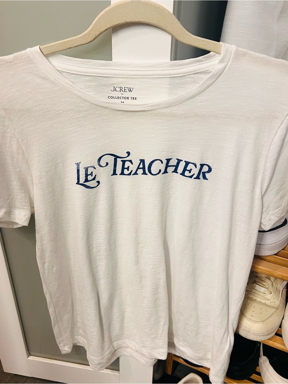 J. Crew White Tee with Blue "Le Teacher" Graphic